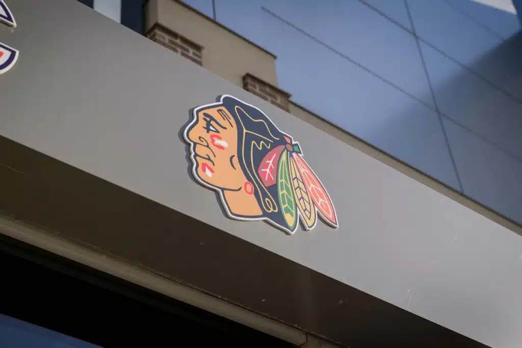 Close up of Chicago Blackhawks logo signage, representing the Chicago Blackhawks sexual assault lawsuit.