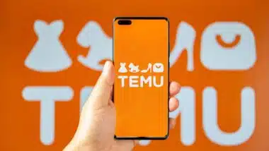 Temu app logo displayed on a smartphone screen with the logo in the background, representing the Temu class action lawsuit.