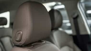Close up of a car headrest, representing the Fiat Chrysler headrest class action.