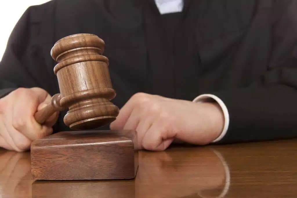 Close up of a judge using a gavel, representing the PA nursing home fraud verdict.