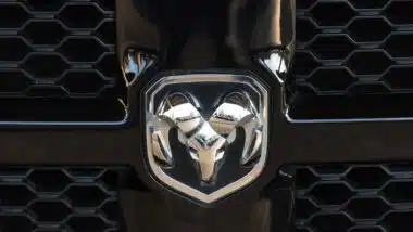 Close up of a Ram emblem on a front bumper, representing the Chrysler Ram and Cab Chassis recall.
