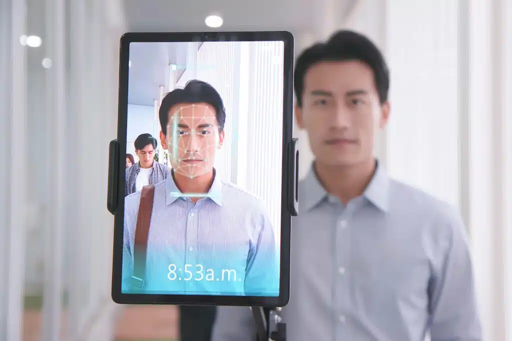 Close up of a man having a facial scan conducted, representing the airport facial recognition bill.
