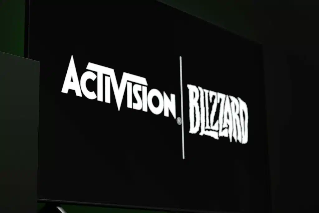 Activision Blizzard logo displayed on a TV screen, representing the Activision Blizzard discrimination settlement.