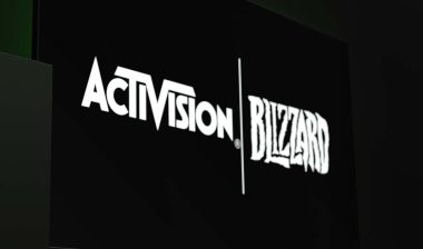 Activision Blizzard logo displayed on a TV screen, representing the Activision Blizzard discrimination settlement.