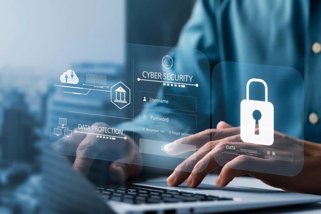 Close up of a man typing on a laptop with a data security overlay, representing the R.R. Donnelley & Sons data breach class action lawsuit settlement.