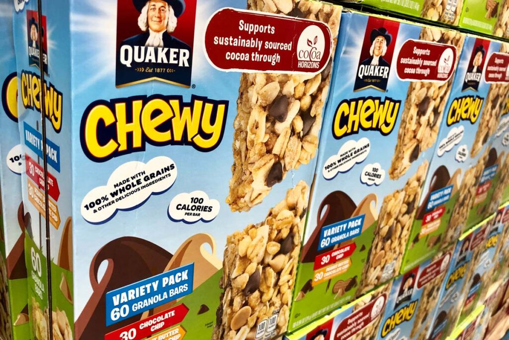 Quaker granola products on a grocery store shelf, representing the Quaker Oats class action lawsuit.