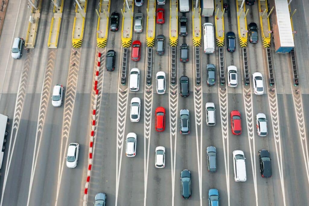 Aerial view of a toll station on a highway, representing the Riverlink fees settlement.