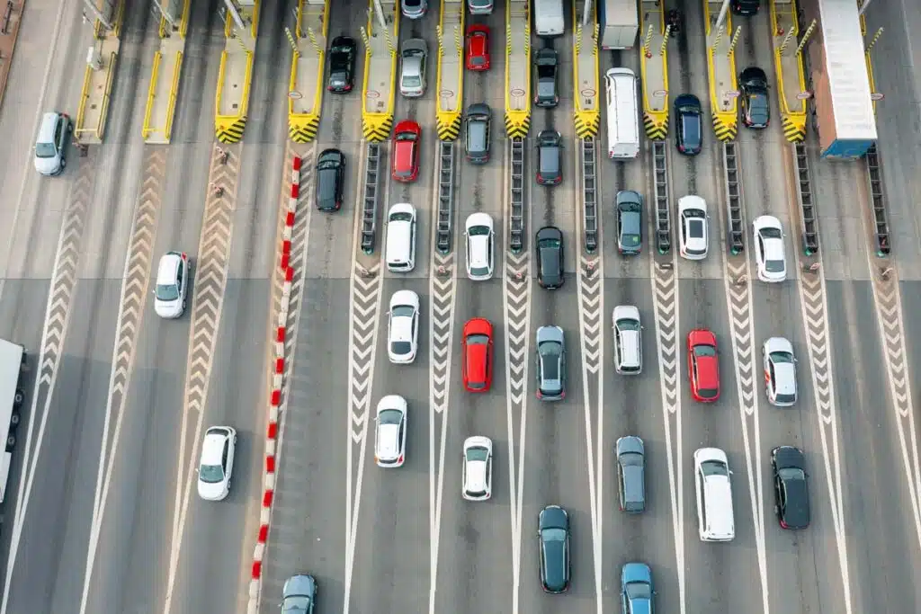 Aerial view of a toll station on a highway, representing the Riverlink fees settlement.