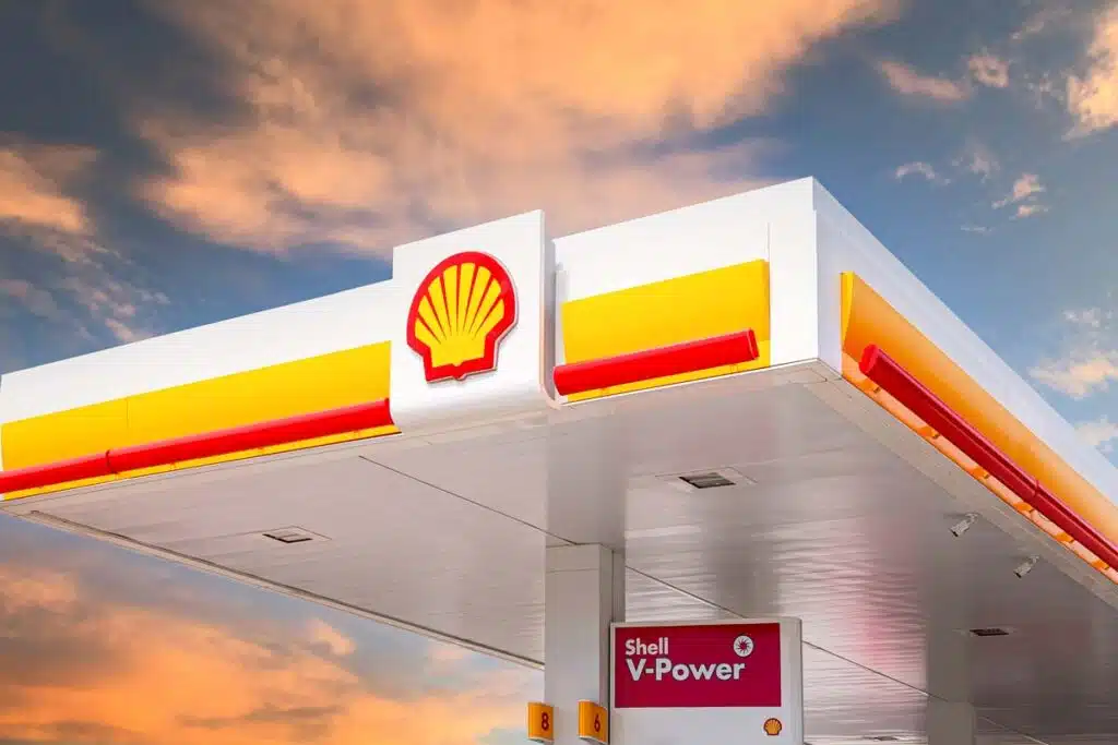 Close up of Shell signage against a cloudy sky at sunset, representing the Shell gas stations gift card class action.