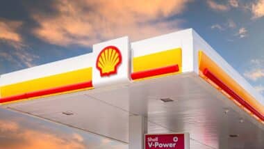 Close up of Shell signage against a sunset, representing the Shell gift card case action.