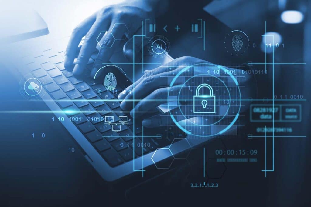 Close up of hands typing on a laptop with a internet data concept overlay, representing the Lincare Holdings data breach class action lawsuit settlement.