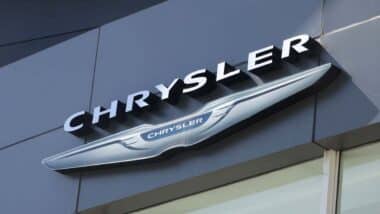 Close up of Chrysler signage, representing the Chrysler headrest trial.