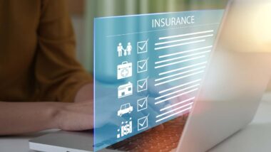 Close up of a woman typing on a laptop with a insurance checklist concept overlay, representing recent insurance class actions and settlements.