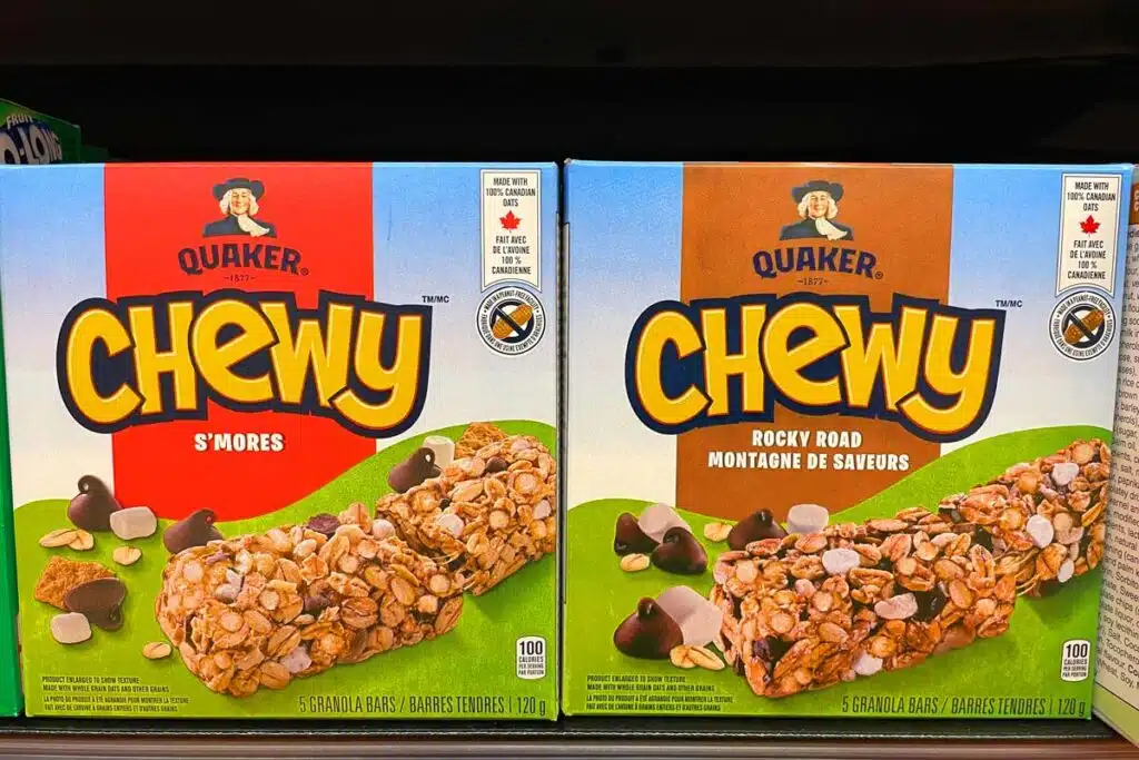 Quaker granola bar boxes on a supermarket shelf, representing the Quaker class action.