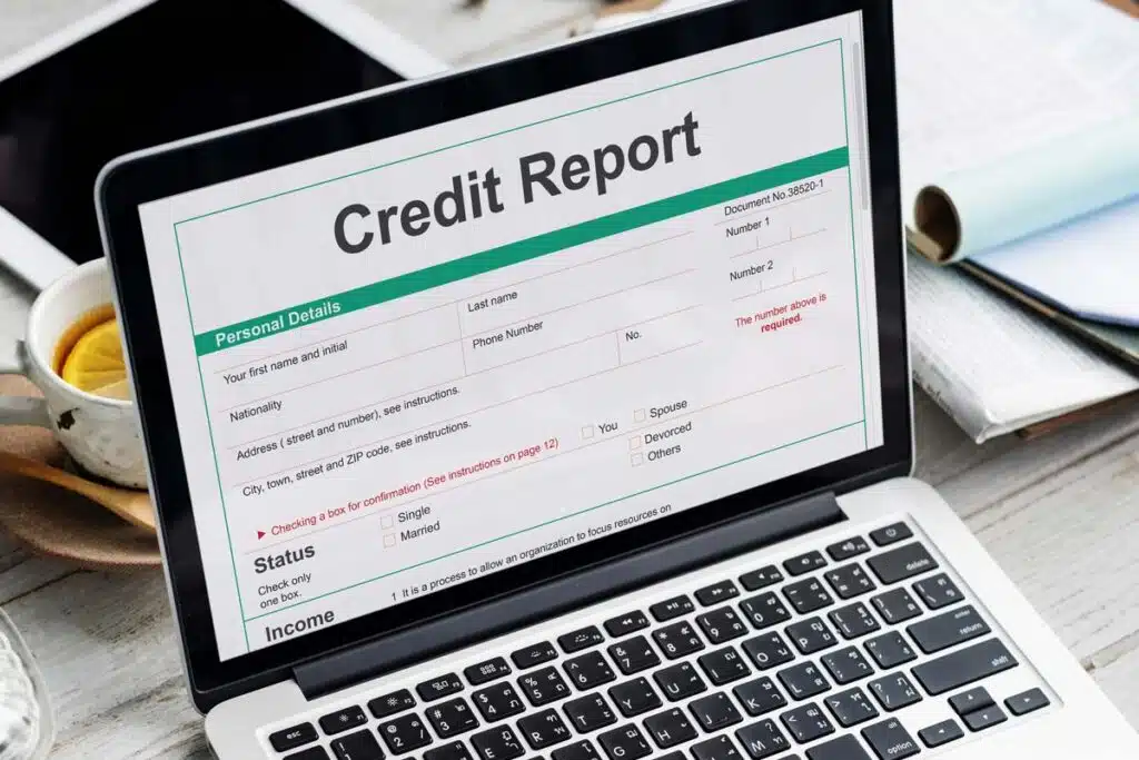 Credit report displayed on a laptop screen, representing the Avantus FCRA class action lawsuit settlement.