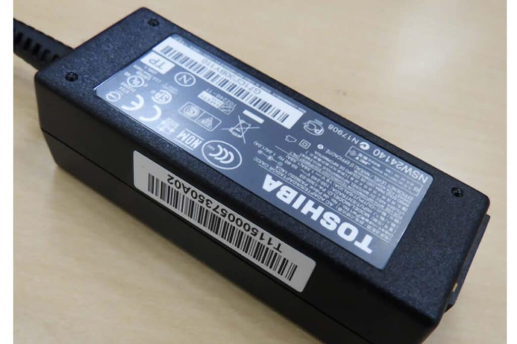 Actual photo of recalled laptop charger by Toshiba, representing the Toshiba laptop adapters recall.