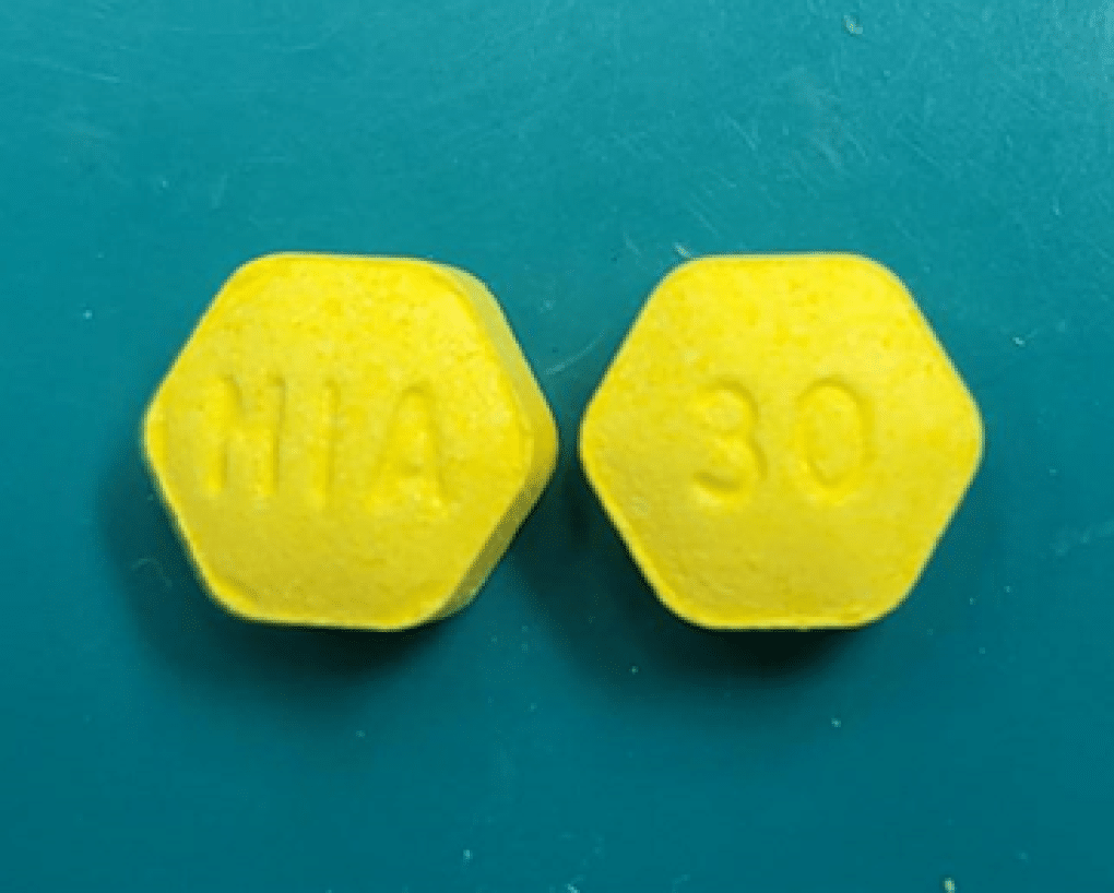 Actual photo of recalled Zenzedi yellow tablets, representing the Zenzedi narcolepsy tablet recall.