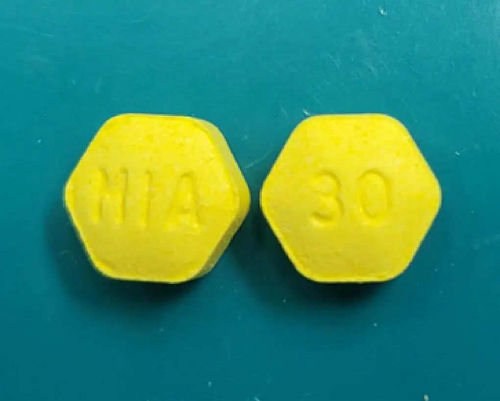 Actual photo of recalled Zenzedi yellow tablets, representing the Zenzedi narcolepsy tablet recall.