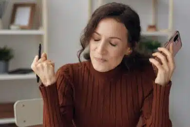 Woman frustrated with debt collection calls.