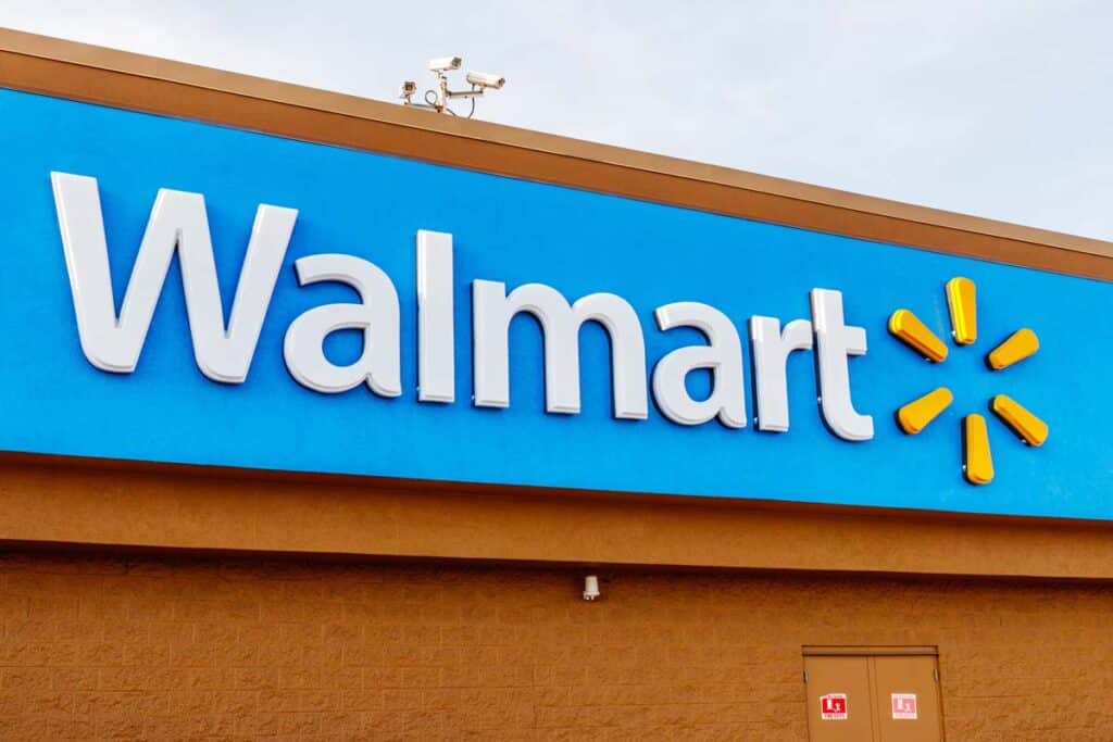 Close up of Walmart signage, representing Walmart lawsuits and settlements.