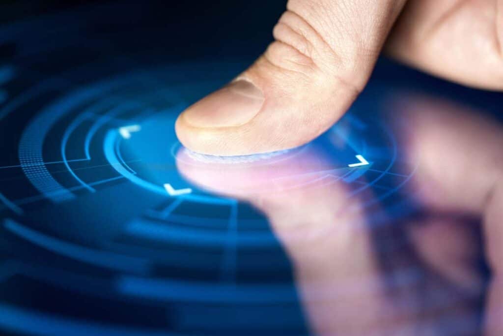 Closeup of a fingerprint being scanned, representing the Haemonetics BIPA class action lawsuit settlement.