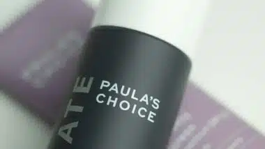 Close up of Paulas Choice logo on a skincare product, representing the Paula's Choice class action.