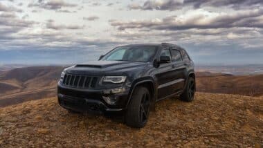 A black 2022 Jeep Grand Cherokee SUV, representing the Jeep Grand Cherokee recall.