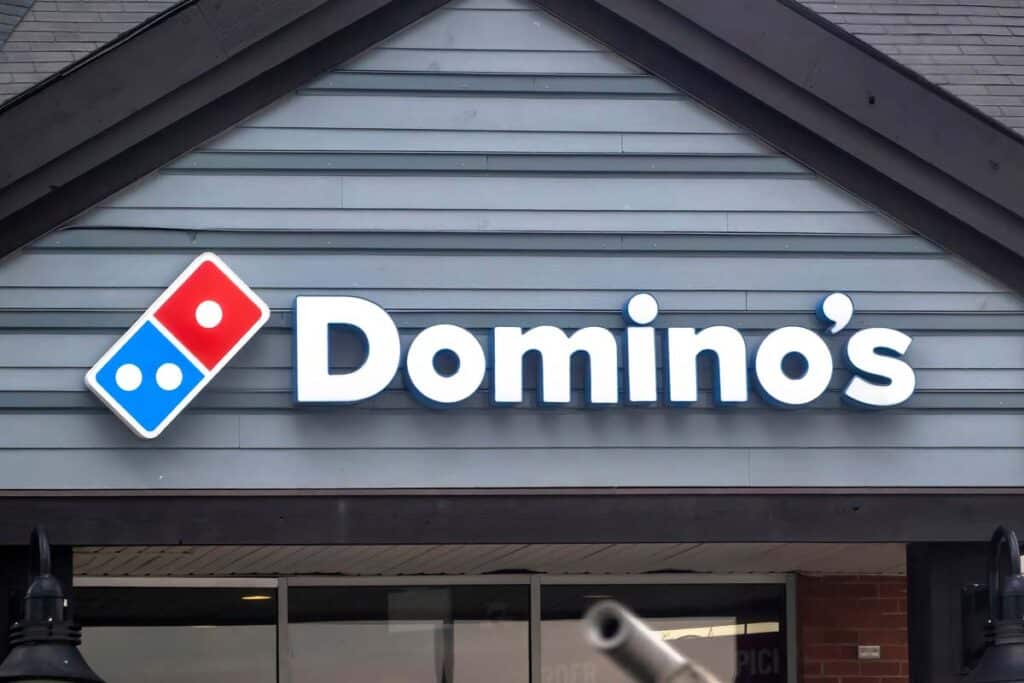 Close up of Domino's signage, representing the Domino's class action.