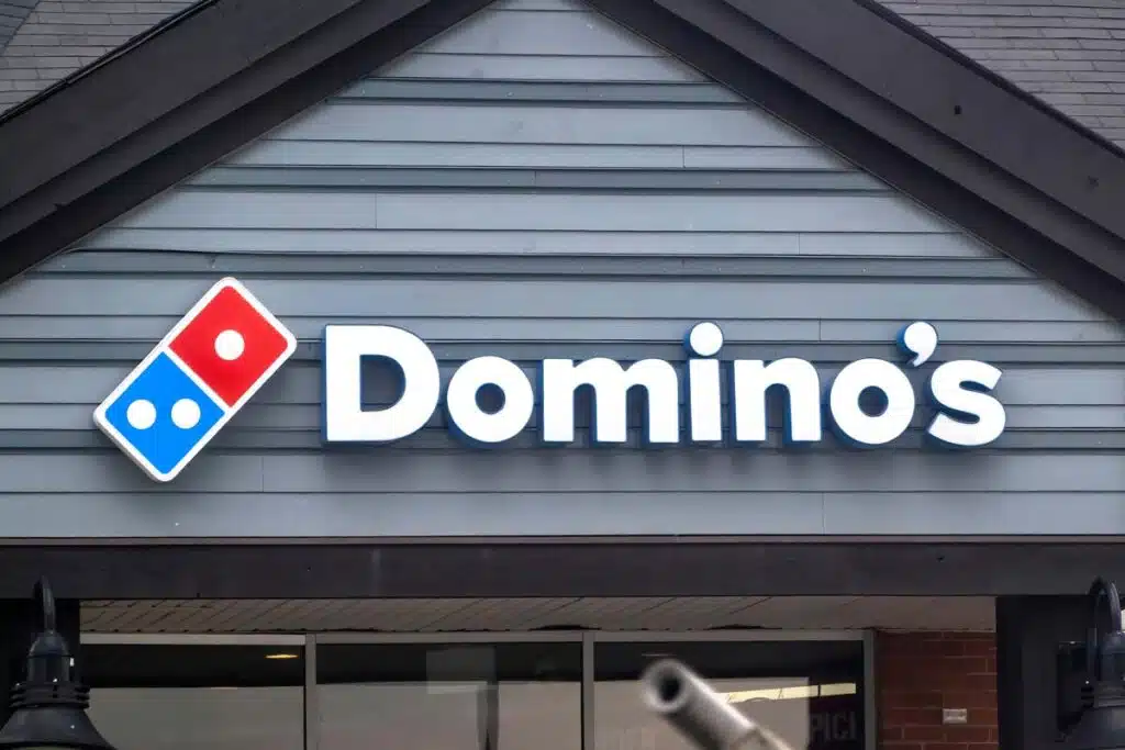 Close up of Domino's signage, representing the Domino's class action.