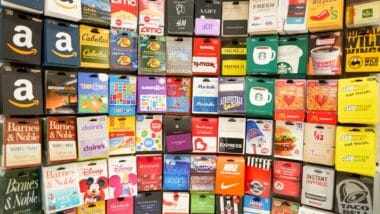 Various gift cards on display at a store, representing the gift cards class actions.