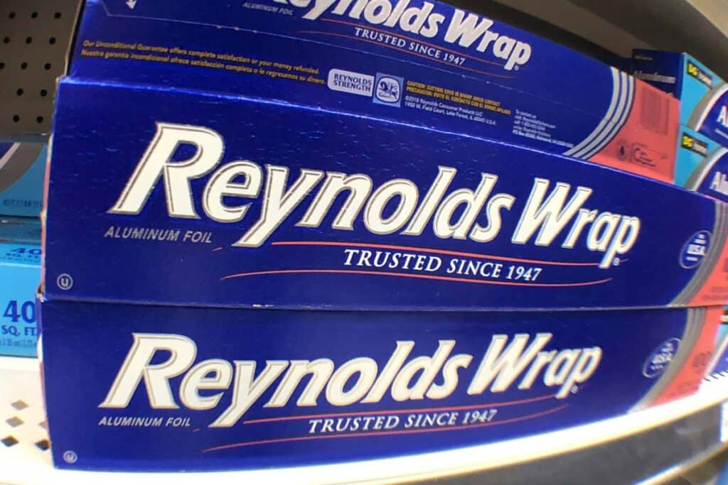 Reynolds Wrap products on a supermarket shelf, representing the Reynolds class action.