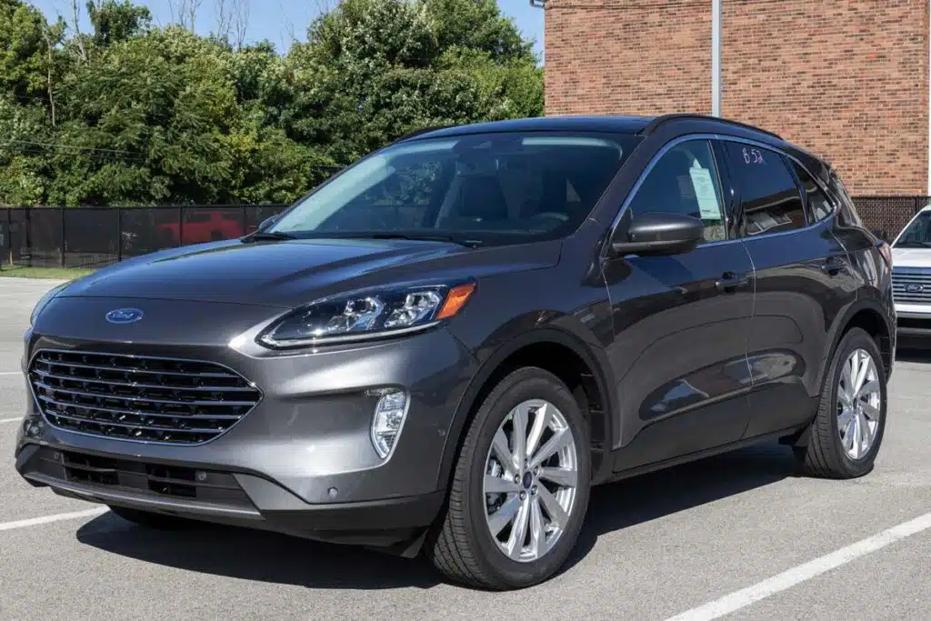 A gray Ford Escape in a dealership lot, representing the Ford class action.