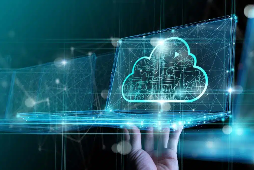 A man holding a laptop with a cloud concept overlay, representing data breach class actions.