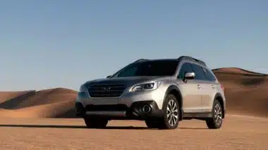 A Subaru Outback in a desert, representing the settlement over allegedly defective Subaru windshields.