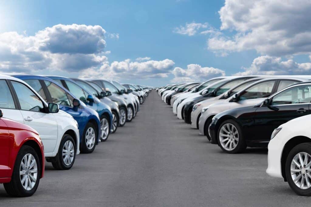Various cars in a lot, representing March vehicle recalls recalls for March.