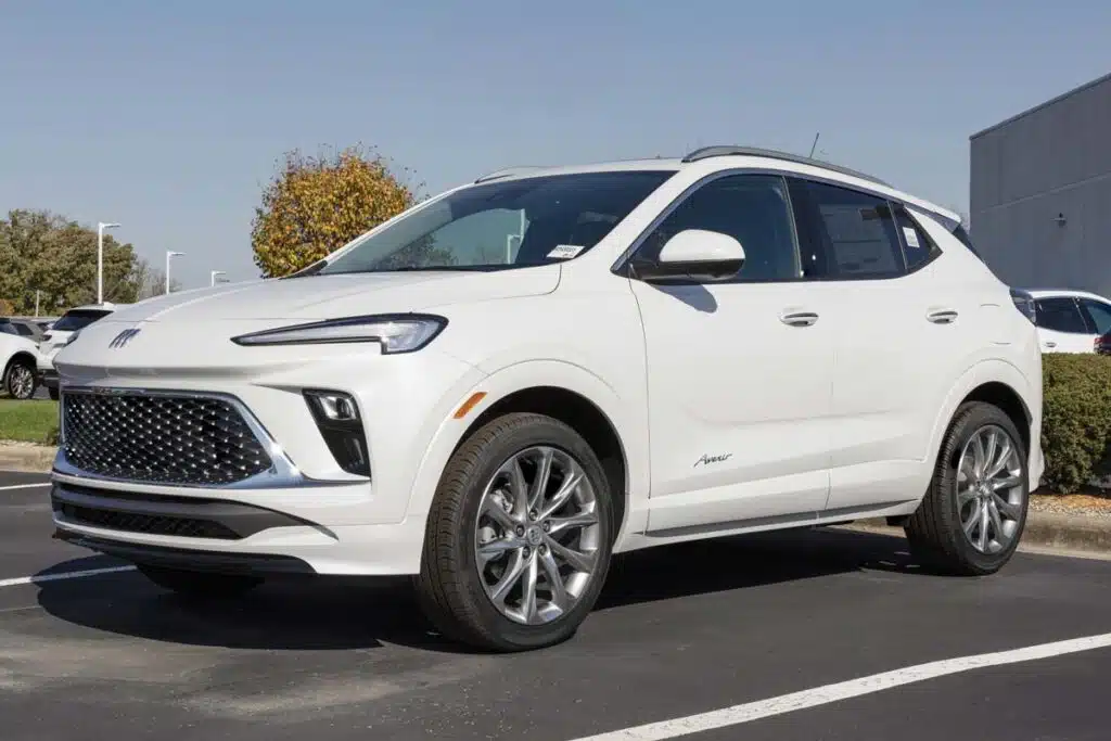 A white Buick Encore in a lot, representing the GM class action.