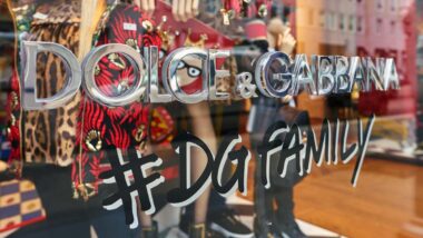 Close up of Dolce & Gabbana signage in a window of a store, representing the Dolce & Gabbana class action.