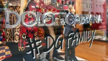 Close up of Dolce & Gabbana signage in a window of a store, representing the Dolce & Gabbana class action.