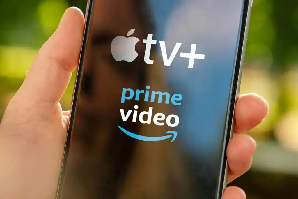 Close up of Apple TV and Prime Video logos displayed on a smartphone display, representing the Apple and Amazon class actions.