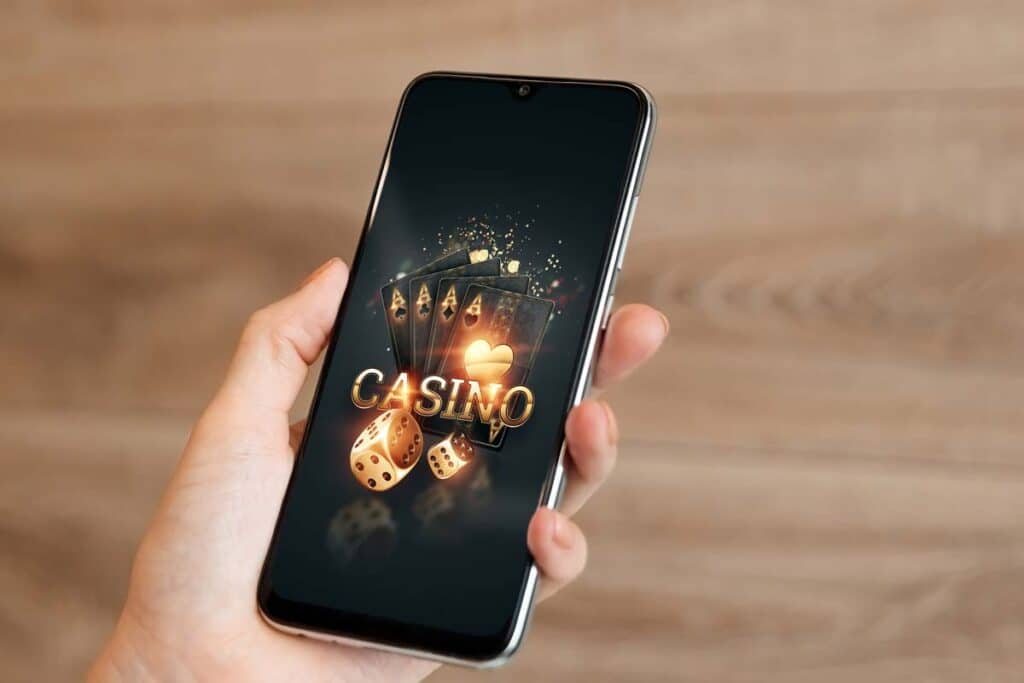 Close up of an online casino displayed on a smartphone, representing the online game class actions.