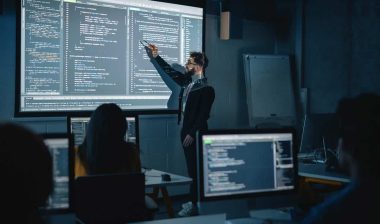 An instructor teaching an IT class, representing the Smoothstack lawsuit.
