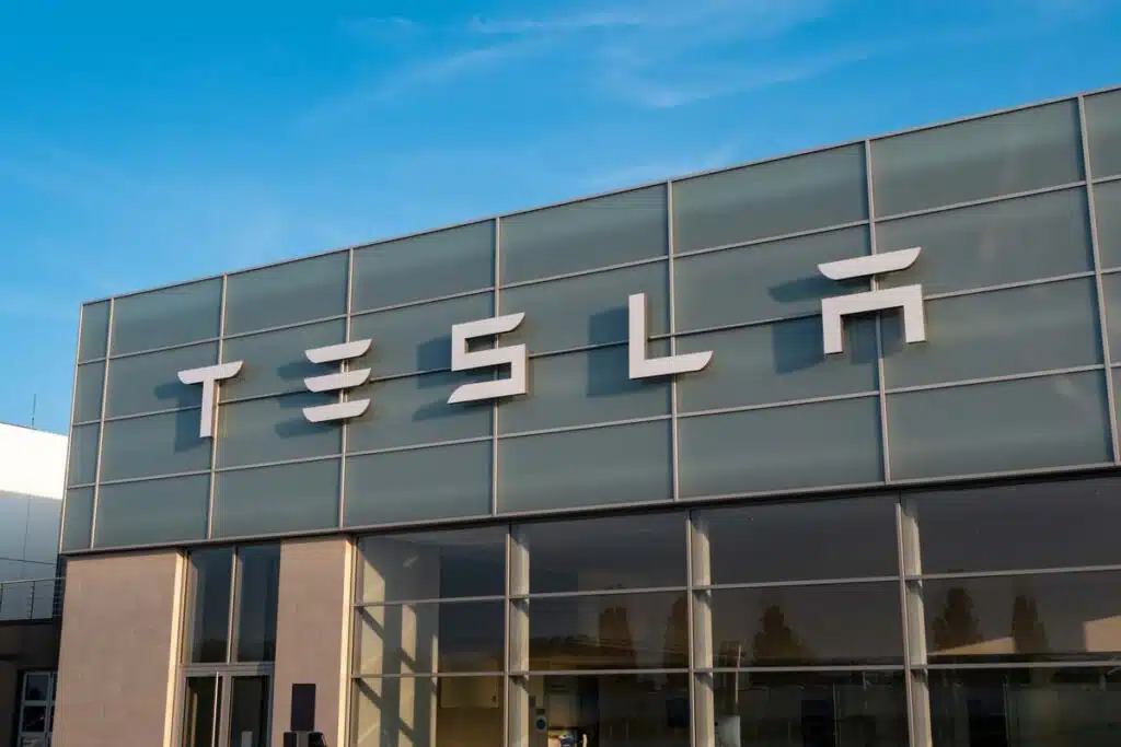 Close up of Tesla signage, representing the Tesla class action.