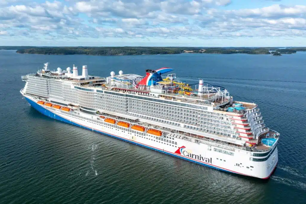 A Carnival cruise ship traveling at sea, representing the Carnival lawsuit.