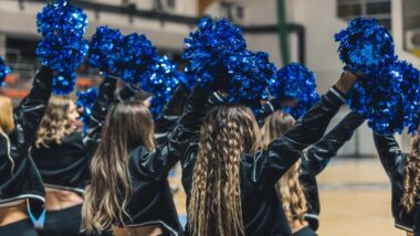 A group of girls at a cheerleading competition, representing the Varsity Brands cheerleading antitrust lawsuit.