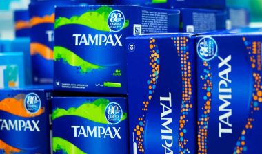 Close up of various product packaging for Tampax, representing the Tampax pure cotton class action.