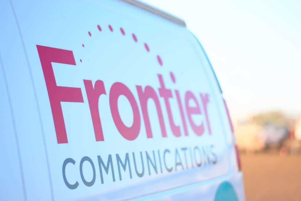Close up of Frontier Communications logo on a van, representing the Frontier Communications class action.