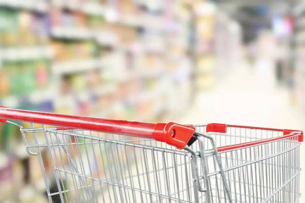 Close up of empty shopping cart in a supermarket, representing top recalls for the week of June 10.