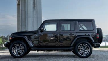 Side view of a black Jeep 4XE, representing the Jeep class action.
