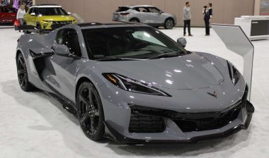 A gray Chevrolet Corvette at an auto show, representing the Chevrolet Corvette recall.