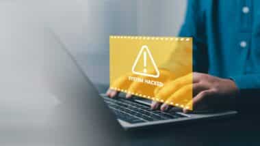 System hacked cybersecurity alert concept